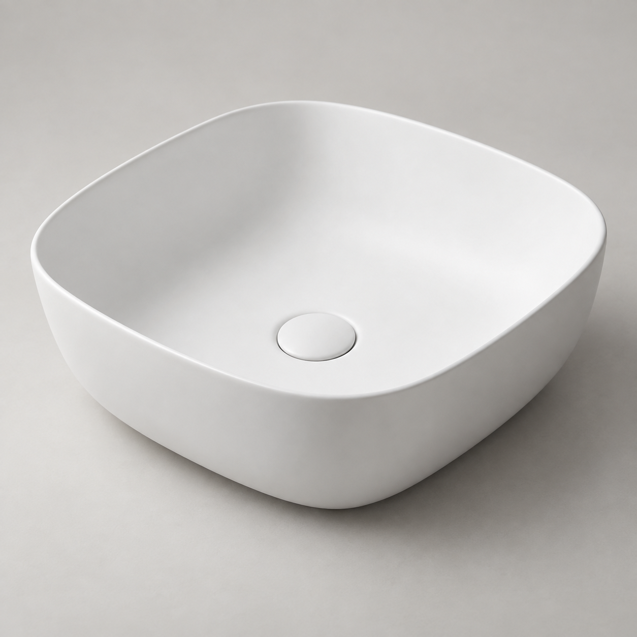 Matte white sculptural tabletop basin